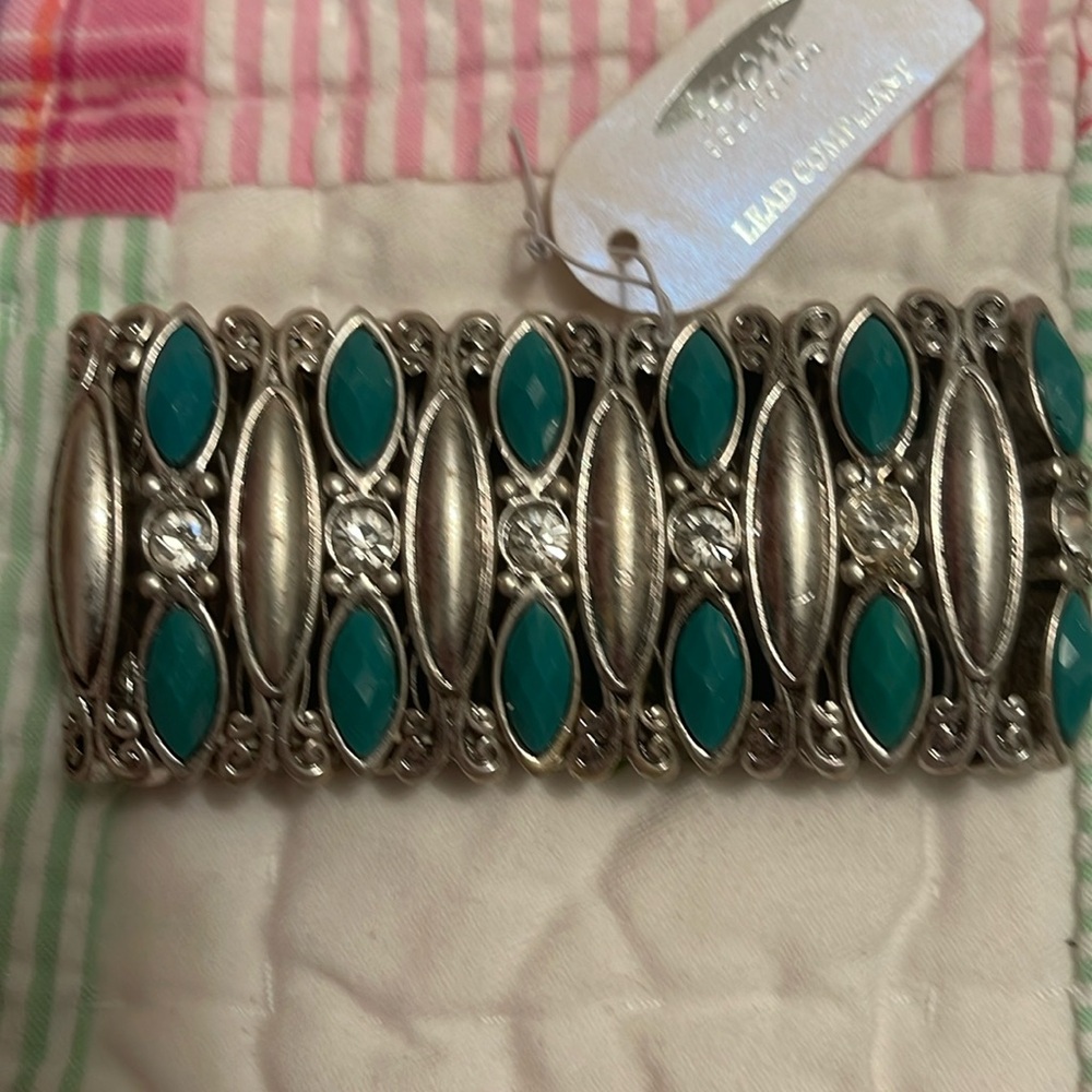 Sliver stretch bracelet with rhinestone and green inserts